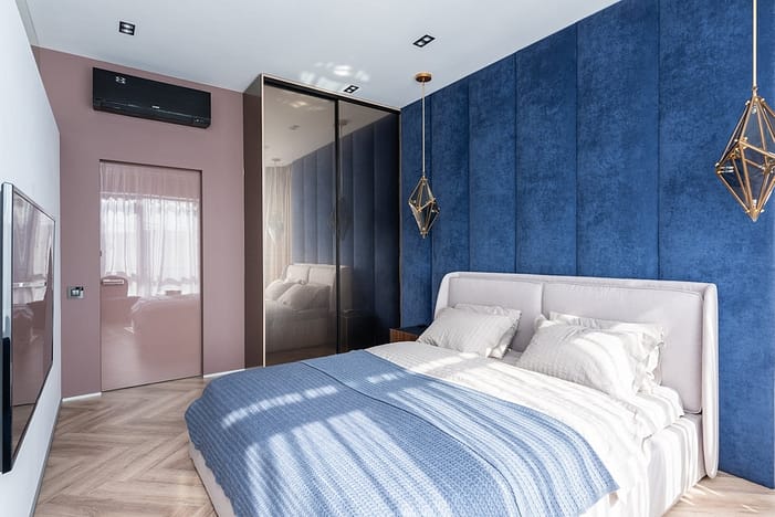 spacious bedroom with soft bed