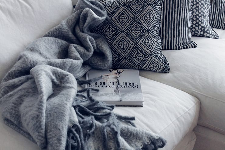 couture book on sofa