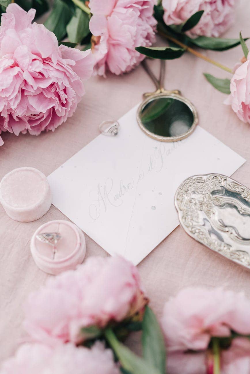 an invitation card over a table